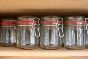 View of jars for filling food in an unwrapped shop View of jars for filling food in an unwrapped shop